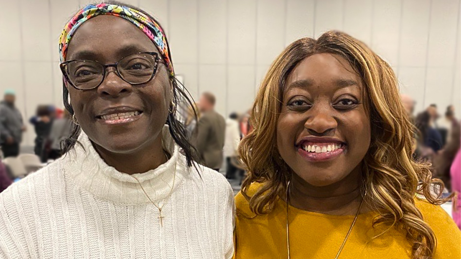 Arlene Robinson and Ada Mbonu pose for a photo at the 2023 MLK Diversity Breakfast in Jackson, Michigan