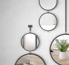 Circular hanging mirrors with black frames