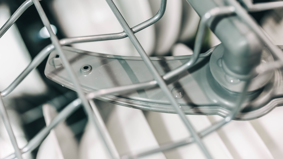 Closeup of a dishwasher spray arm