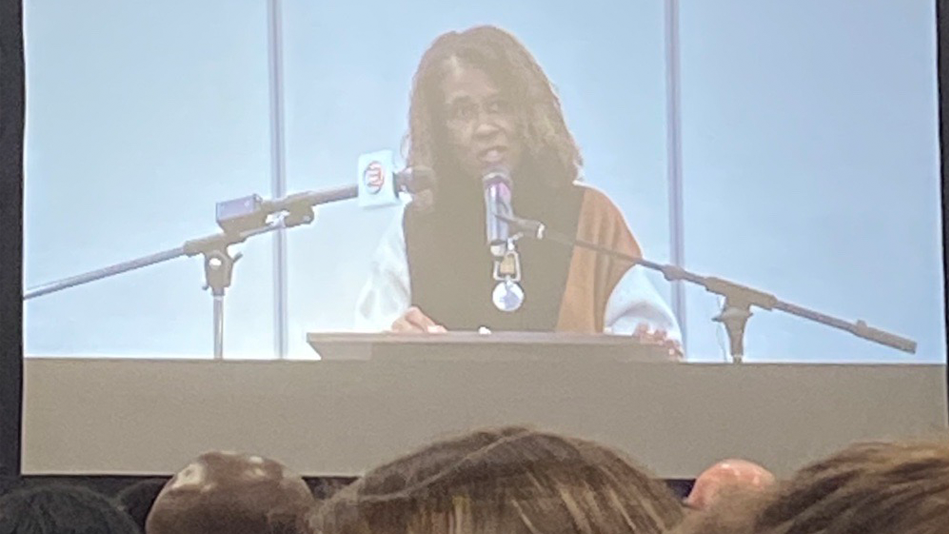 Paula Cunningham, Michigan AARP President, gives a speech at the 2024 MLK Diversity Breakfast
