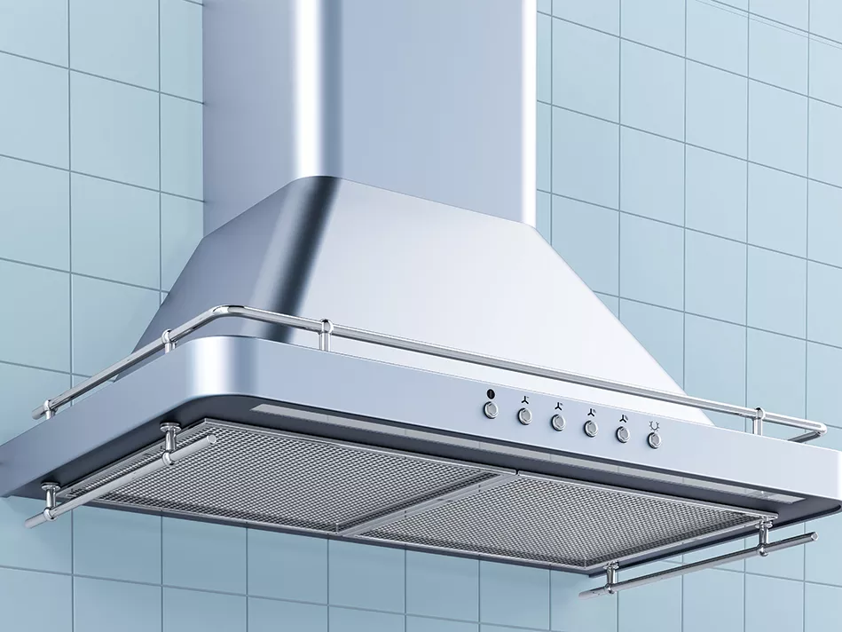 A kitchen exhaust fan hangs low with a blue tile background