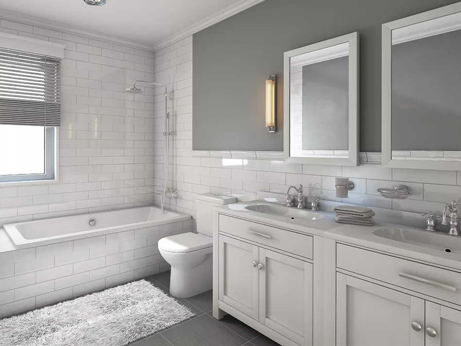 A luxury white-and-gray bathroom with double mirrors, double sinks, a toilet, and a tub
