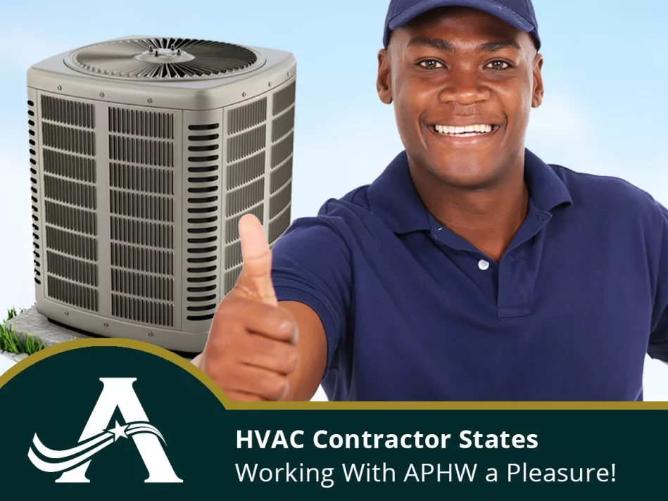 Black male in a blue shirt and ballcap gives a thumbs up in front of an A/C unit
